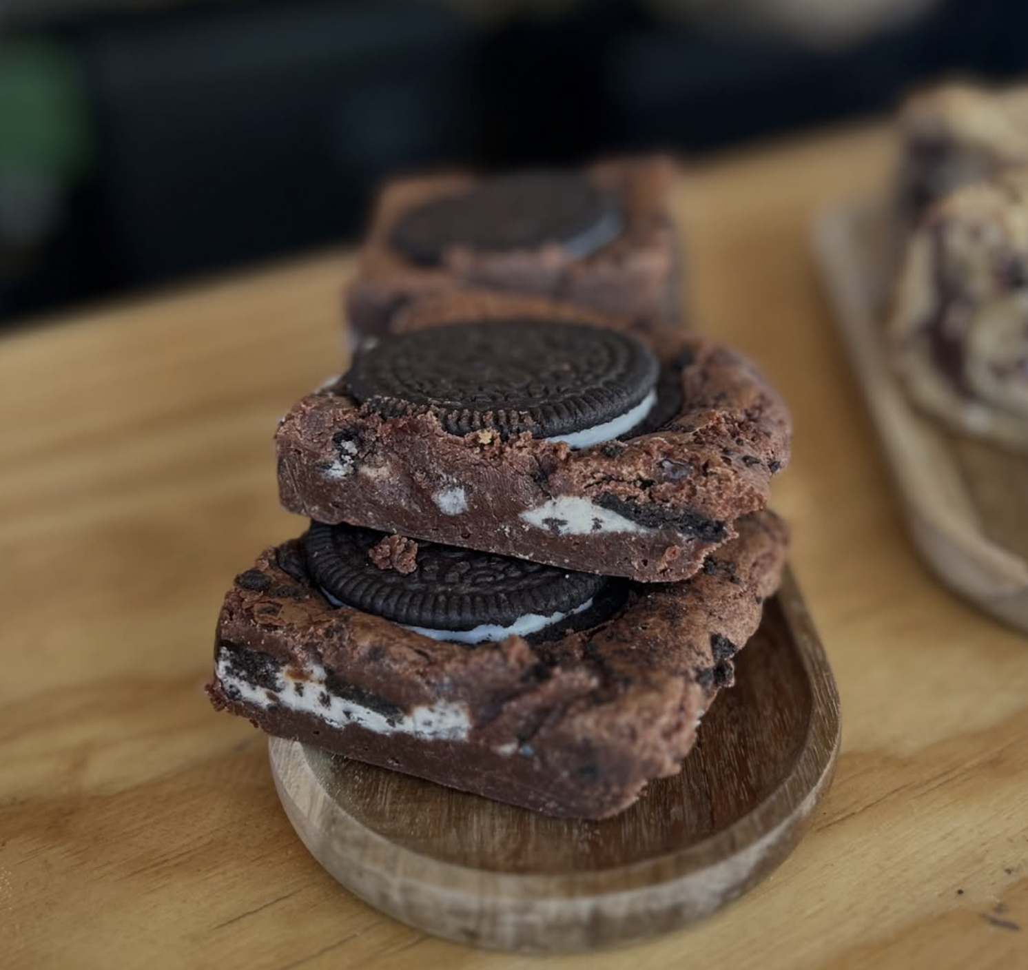 Stacked Oreo brownies, freshly baked and gooey in the middle